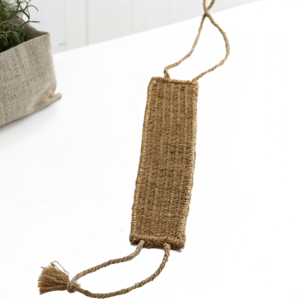 Bande exfoliante pour le dos pliée avec senteur naturelle relaxante, idéale pour un massage bien-être quotidien